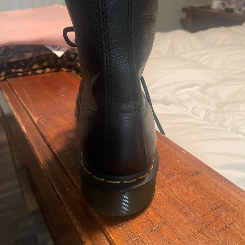 Pair of woman’s doc martens size 9. Black with yellow stitch